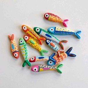 Fish brooches