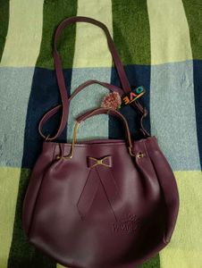 Chic Purple Handbag with Bow Accent