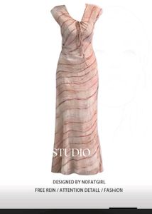 Flowy Maxi Dress with Tie Detail by Chin studio