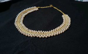 Elegant Pearl and Gold Necklace