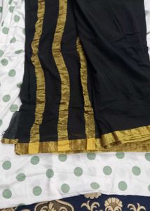 Elegant Black Saree with Golden Border