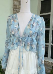 Blue Floral Tie-Front Blouse with white skirt