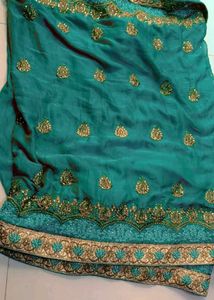 Exquisite Teal Embroidered Saree