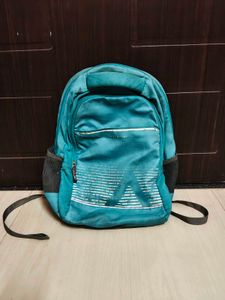 Teal Backpack with Geometric Design