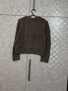 Zara sweater with gold-tone embellishments.