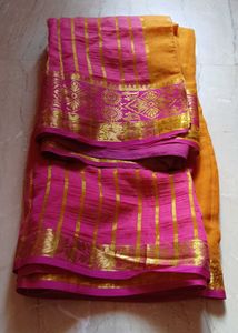 Vibrant Pink Saree with Gold Stripes