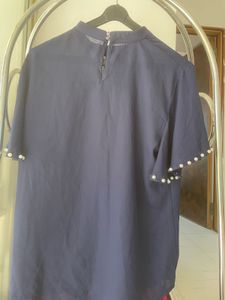 Elegant Navy Top with Pearl Details