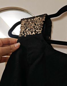 Chic Black Dress with Sequined Shoulders