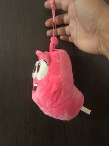 pink Larva character plush keychain featuring