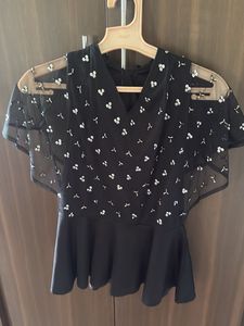 Black Peplum Top with Sheer Overlay