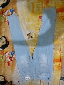 Light Wash Distressed Denim Jeans
