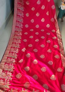 Vibrant Pink Saree with Peacock Motifs