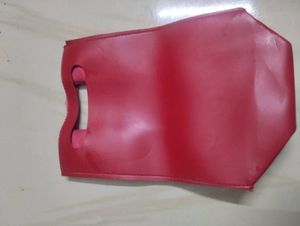 Red Wanderlust Clutch Bag . nykaa leather ba