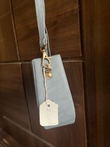 Grey half moon sling bag