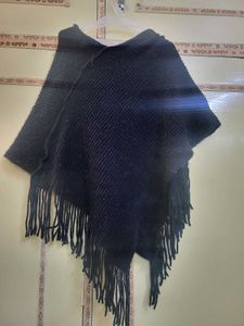 Chic Black Poncho with Red Flower Accent