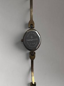 Elegant Timesquartz Gold-Tone Watch