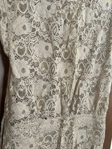Net Jumpsuit With Bottons In Front To Open