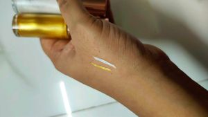 white and golden eyeliner combo