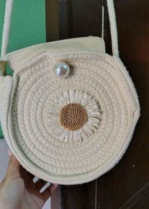 Chic Woven Crossbody Bag with Pearl & Daisy Accent
