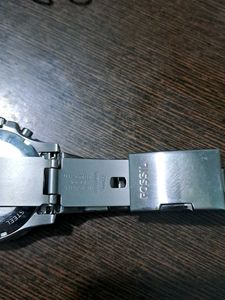 FOSSIL SILVER CHAIN WATCH WITH BLUE DIAL.