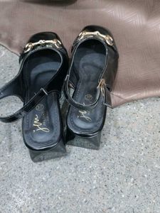 Chic Black Patent Heels with Gold Buckle