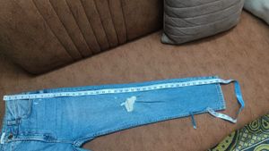 Light Wash Distressed Denim Jeans
