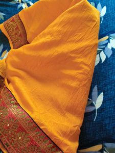 Vibrant Yellow Saree with Red Border
