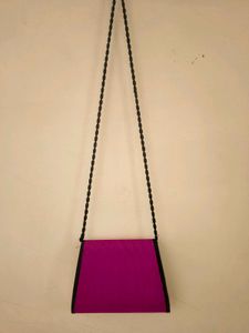 Vibrant Embroidered pink sling Bag