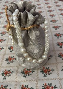 Elegant Pearl Embellished Potli Bag