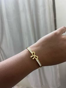 Gold Bow Bangle with Crystals