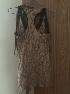 Chic Lace Top with Bold Bow Accent