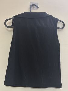 Sleek Black Ribbed Collared Sleeveless Top