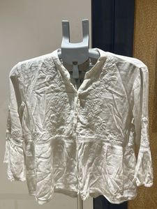 White Embroidered Peplum Top