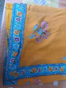 Beautiful Orange Saree with Floral Print