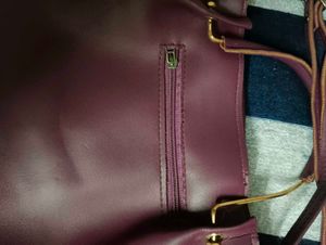 Chic Purple Handbag with Bow Accent