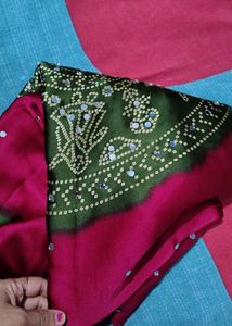 megenta Bandhani Saree with mehndi Border