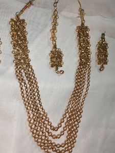 Elegant Pearl and Gold Jewelry Set