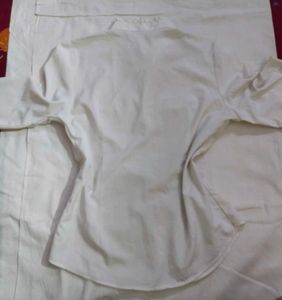 white pleated shirt