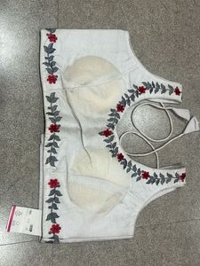 Embroidered White Sleeveless Blouse
