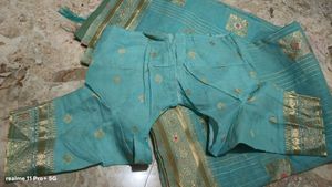Beautiful Teal Saree with Gold Border