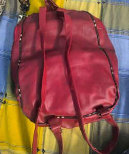 Stylish Red Backpack with Plaid Detail