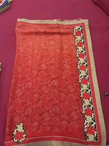 Beautiful Red Saree with Floral Design