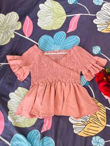 Smocked Peplum Top