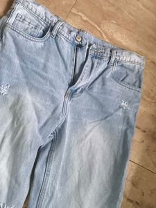Light Wash Ripped Jeans (never worn)