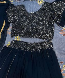 Stunning Teal Embellished Lehenga Choli