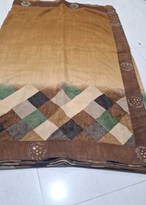 Elegant Brown Saree with Unique Print