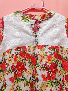 Floral knee Length Dress. Sleeveless. Sleeves Are Attached For Image Purpose Only. Will Fit Bust 34, 36, 38, 40.