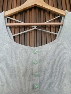 Stylish Ribbed Knit Top with Criss-Cross Back