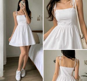 Classic White Sundress with Tie Shoulders