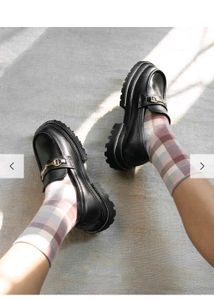 Chic Black Loafers with Gold Buckle